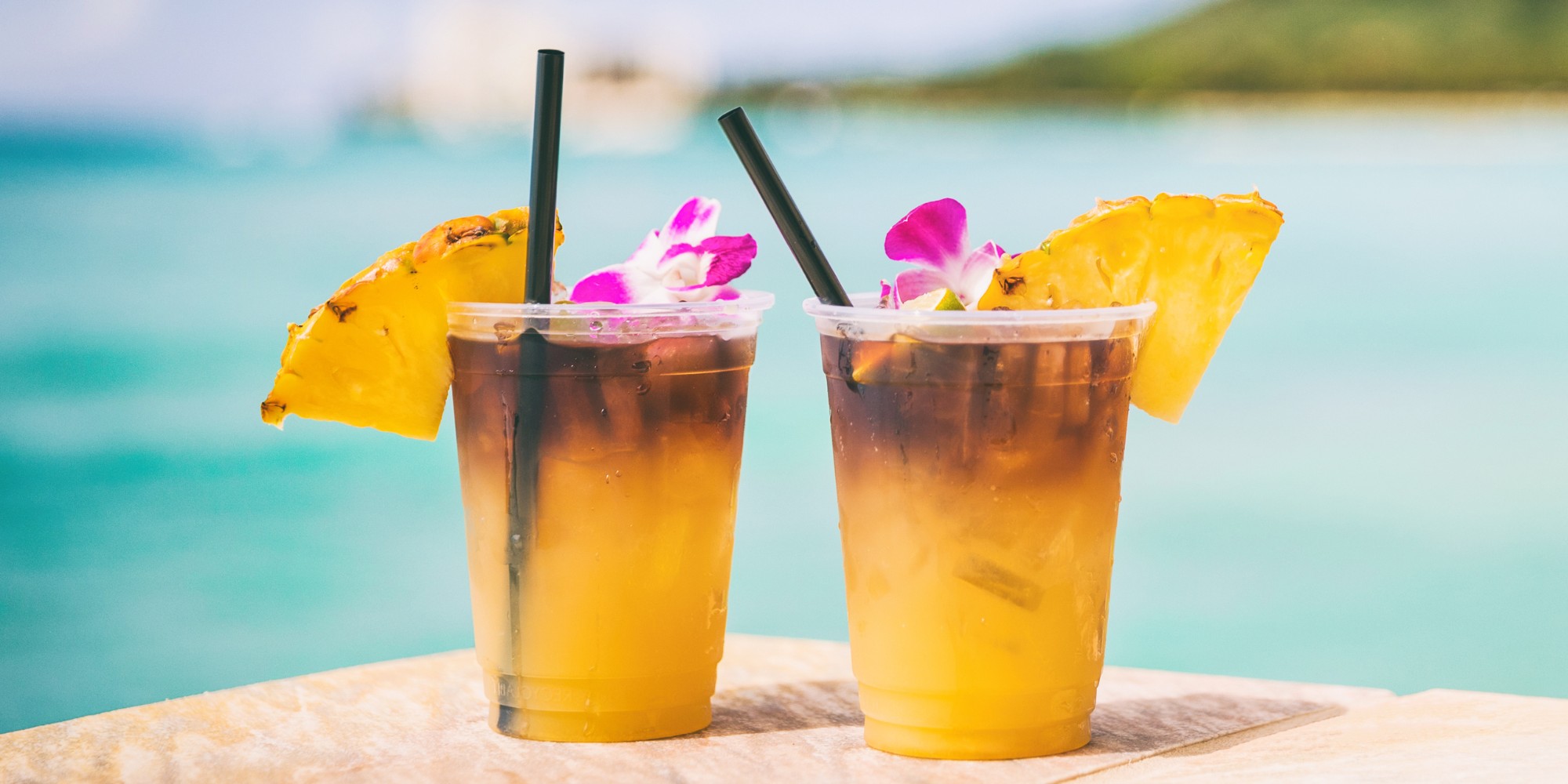 beachside cocktails bought with cash from Hawaii's best ATM services provider